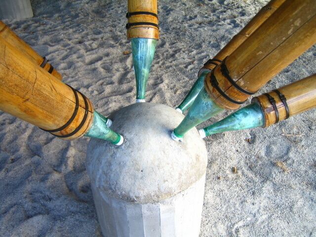 The Bamboo rest stop is reinforced with Pellegrini plastic bottles filled with cement at the end of each pole. This what keeps the structure  in place. Recycled green. #green