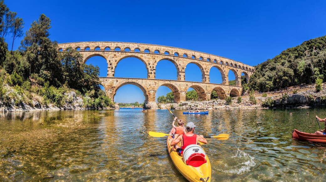 Pont du Gard with paddle boats is an old Roman aqueduct in Provence, France