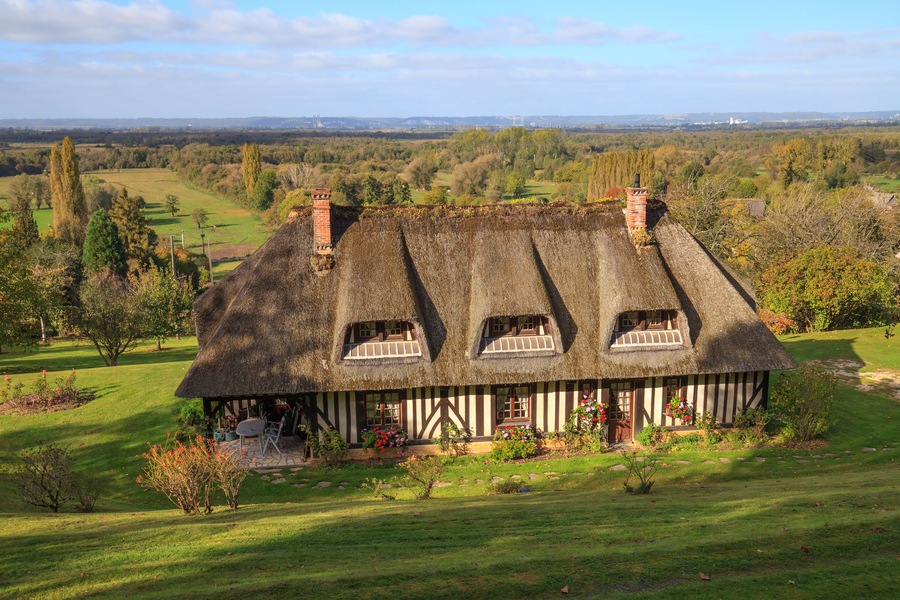 Thatched cottage in the "Marais Vernier", Normandy, France