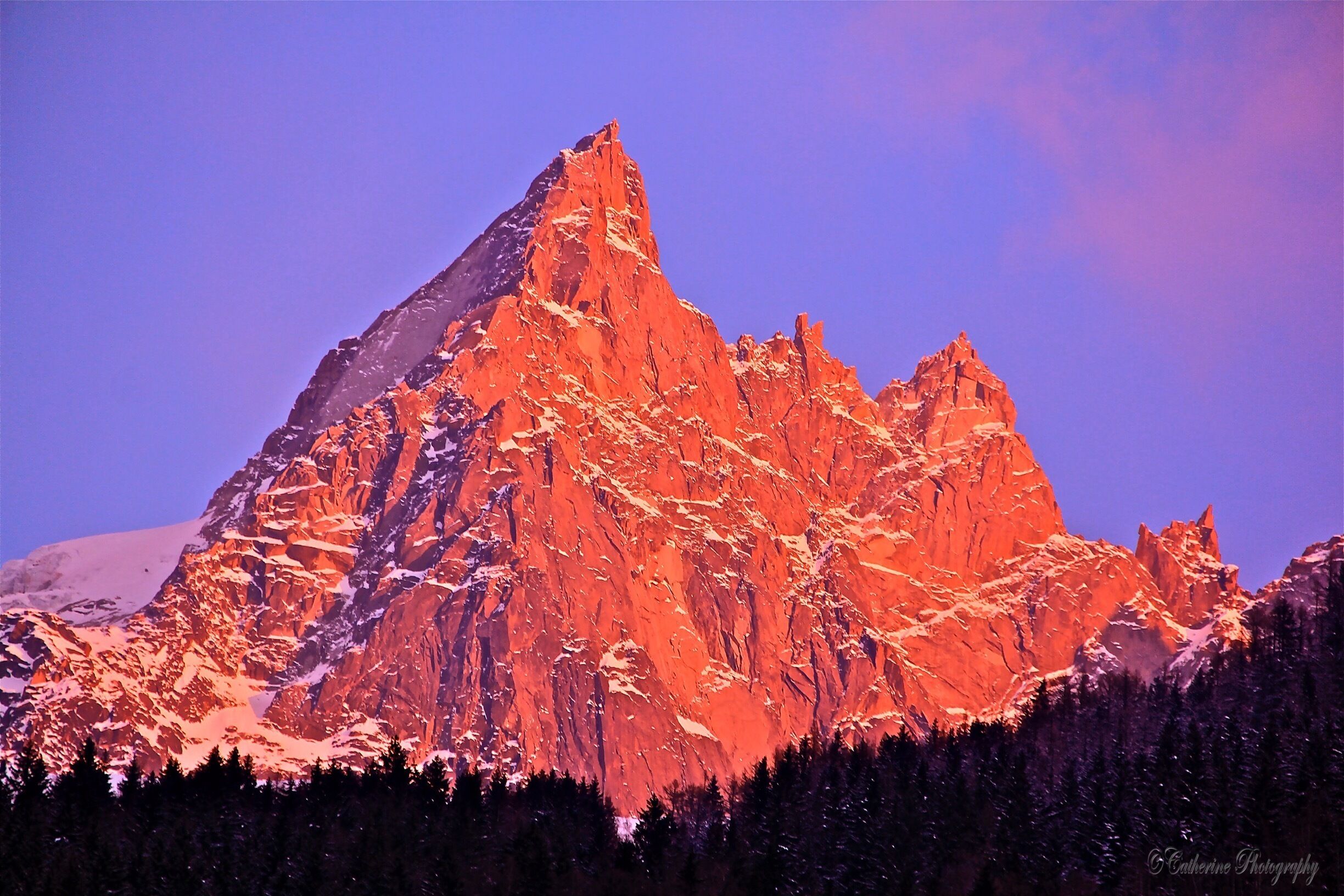 Fire on the mountains peaks  - Mont Blanc. glad that we decided to stay longer in the town and get this glorious sighing of Mont Blanc lightened up with fire. #France #Europe #hiking #nationalpark #travel #snow #landscape #nature #red #mountains 