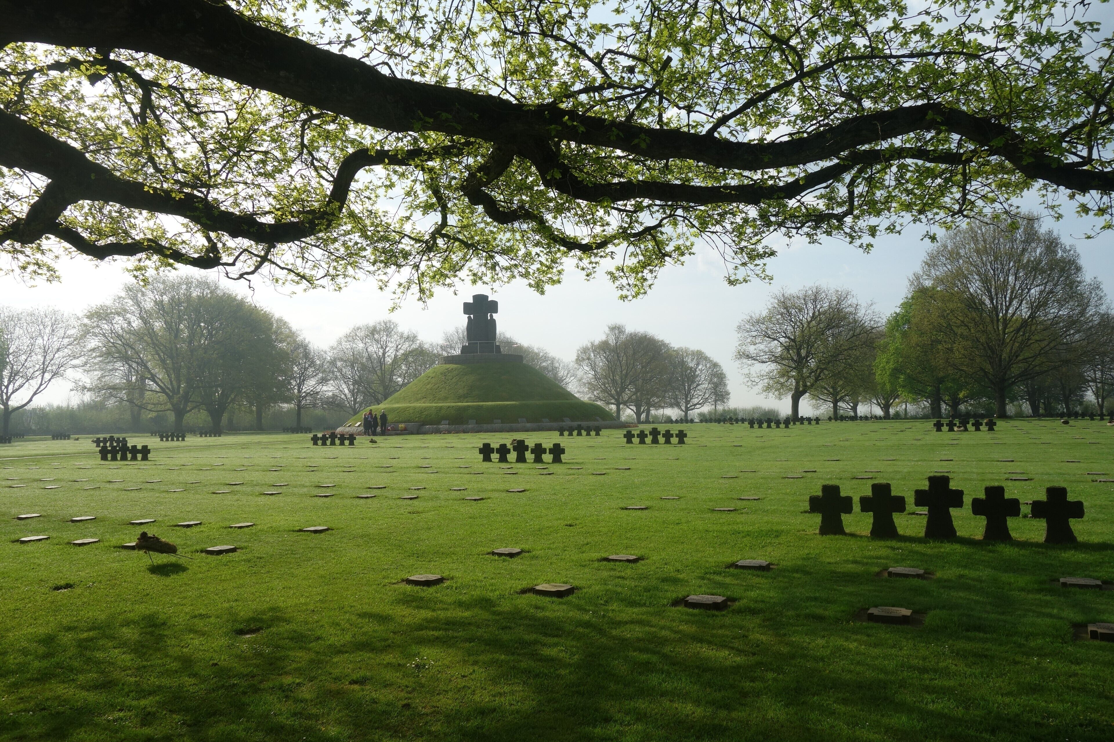 Normandy, traces of D-day
La Cambe German War Cemetery. 21,222 German soldiers are buried here. It is a very different place to the American and Commonwealth cemeteries. The crosses here are made from grey schist and do not mark individuals graves. Instead, burial locations are marked by plaques on the ground. The majority of the German war dead buried at La Cambe – the youngest was 16 –  fell between 6th June and 20th August 1944. #D_day_Normandy  #History