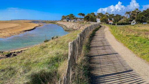 pedestrian path on the seaside in the nature reserve of the beautiful henriette in vendee, faute sur mer , france