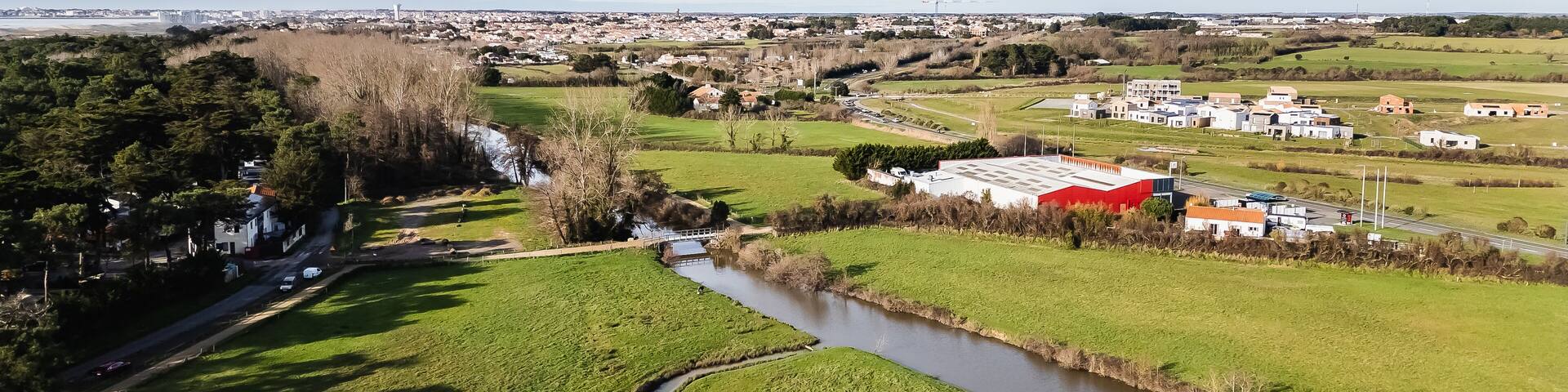 Aerial drone view of a flood zone along the Jaunay River near Givrand, France