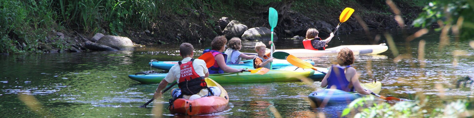 Canoeing the river at Arzano, a great place to relax with the family.