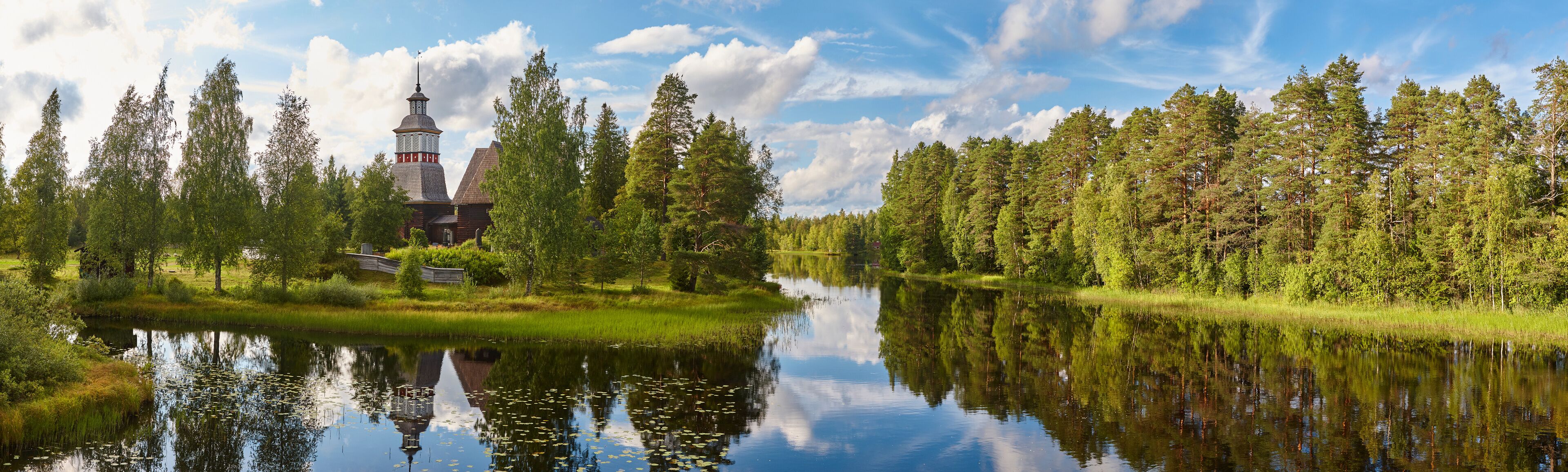 Finland landscape with forest and lake. Petajavesi church. Travel