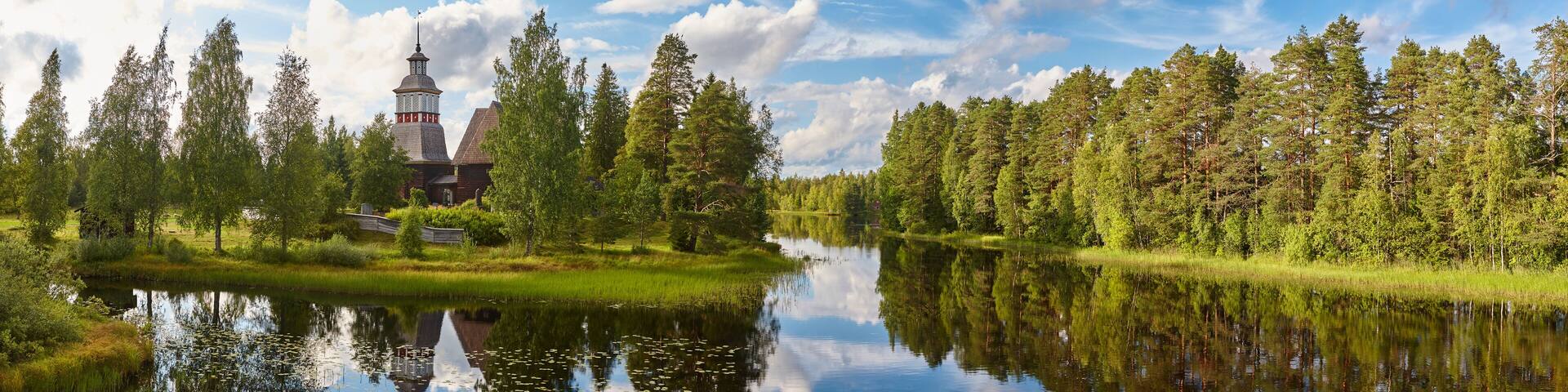 Finland landscape with forest and lake. Petajavesi church. Travel