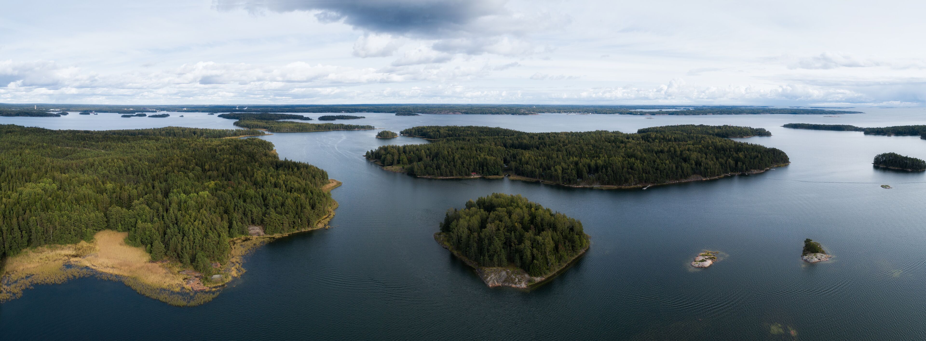 Aerial view of sea and islands at summer time. Finland. The Archipelago. Nordic Natural Landscape.