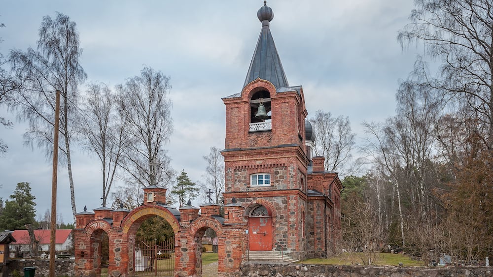 Road comes from gates to Varska orthodox church. Estonia.