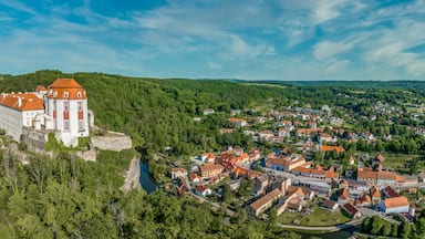 Aerial panorama view of the Thaya river curving at Vranov nad Dyji with old Gothic castle structure turned into a representative Baroque residence with the extensive landscape park