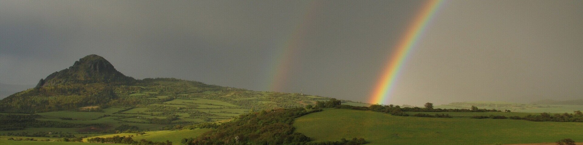 Rainbow over Bořeň Hill