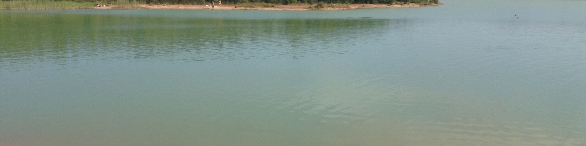 Lake between Suchdol nad Lužnici and Majdelena in South Bohemia. 
An old sand mine that is now a popular destination for swimming. Clean water but with poor visibility.
It's awkward to get to by public transport, but worth the trip if you are around Třeboň  or České Budějovice.
#swimming #hiddengem #southbohemia
