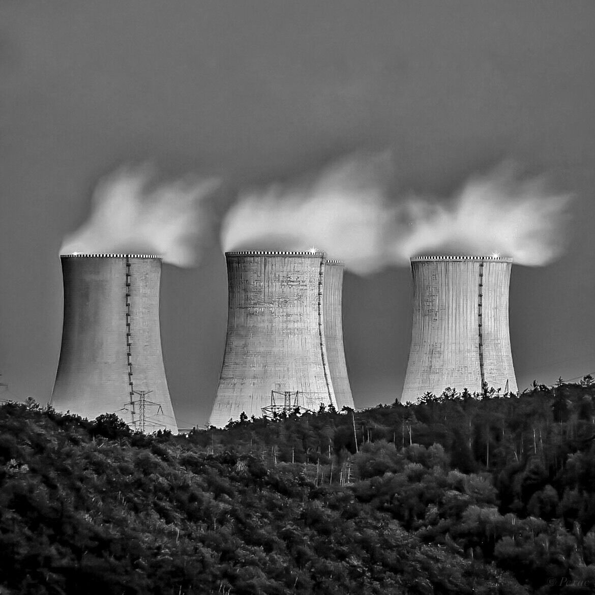 Night view over Mohelno dam to Dukovany nuclear plant