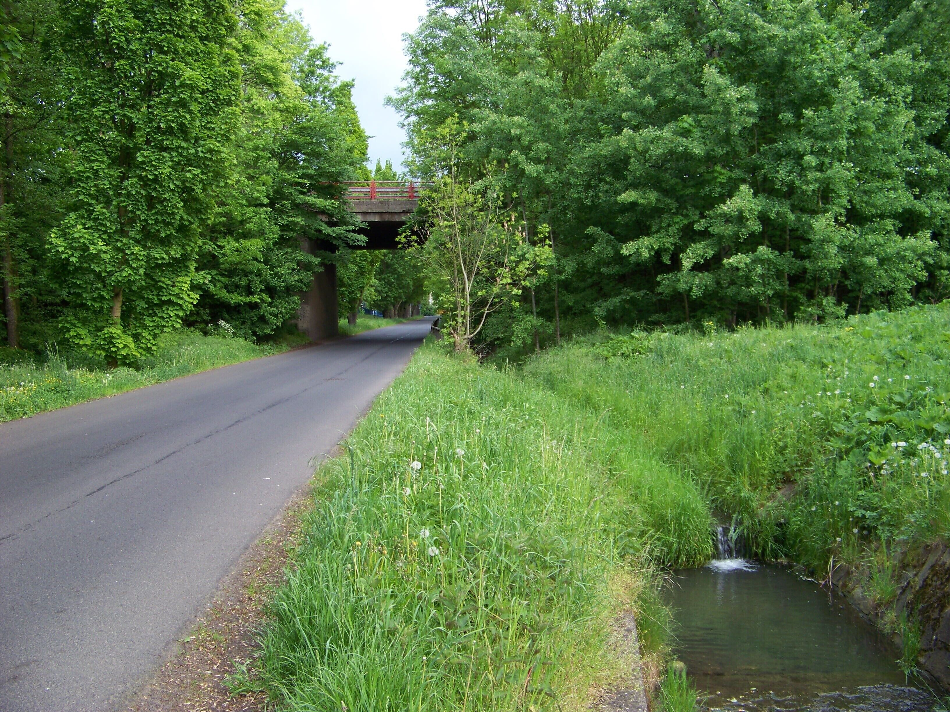 Chlumec, Ústí nad Labem District, Ústí nad Labem Region, Czech Republic. U šmelce street, Chlumecký stream, a bridge of the road I/13.