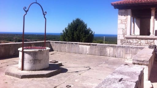 Old part of Visnjan- partly surrounded by town walls built in the 13th and 14th century the square is adorned by a 27m high bell tower, 18th century municipal loggia and the Parish church of SS. Quiricus and Julita.