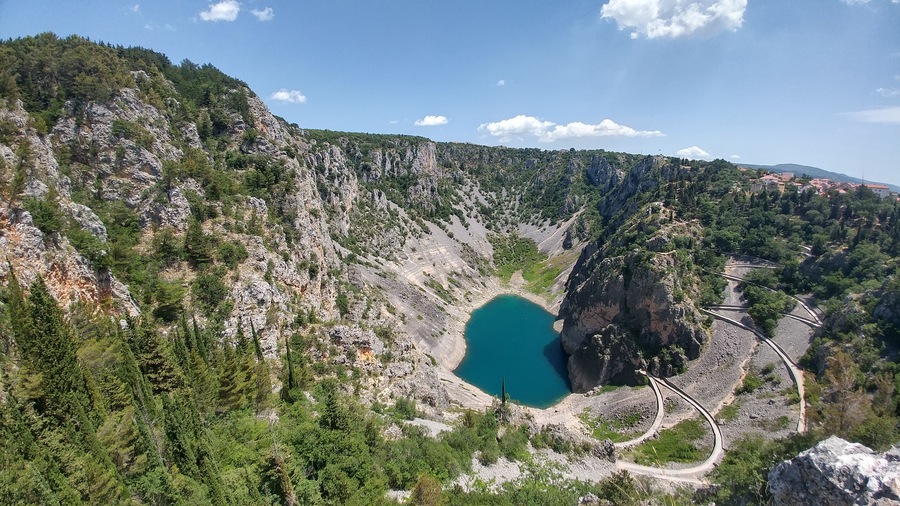 Blue Lake (Croatian: Modro jezero or Plavo jezero) is a karst lake located near Imotski in Croatia. It lies in a deep sinkhole possibly formed by the collapse of an enormous cave.