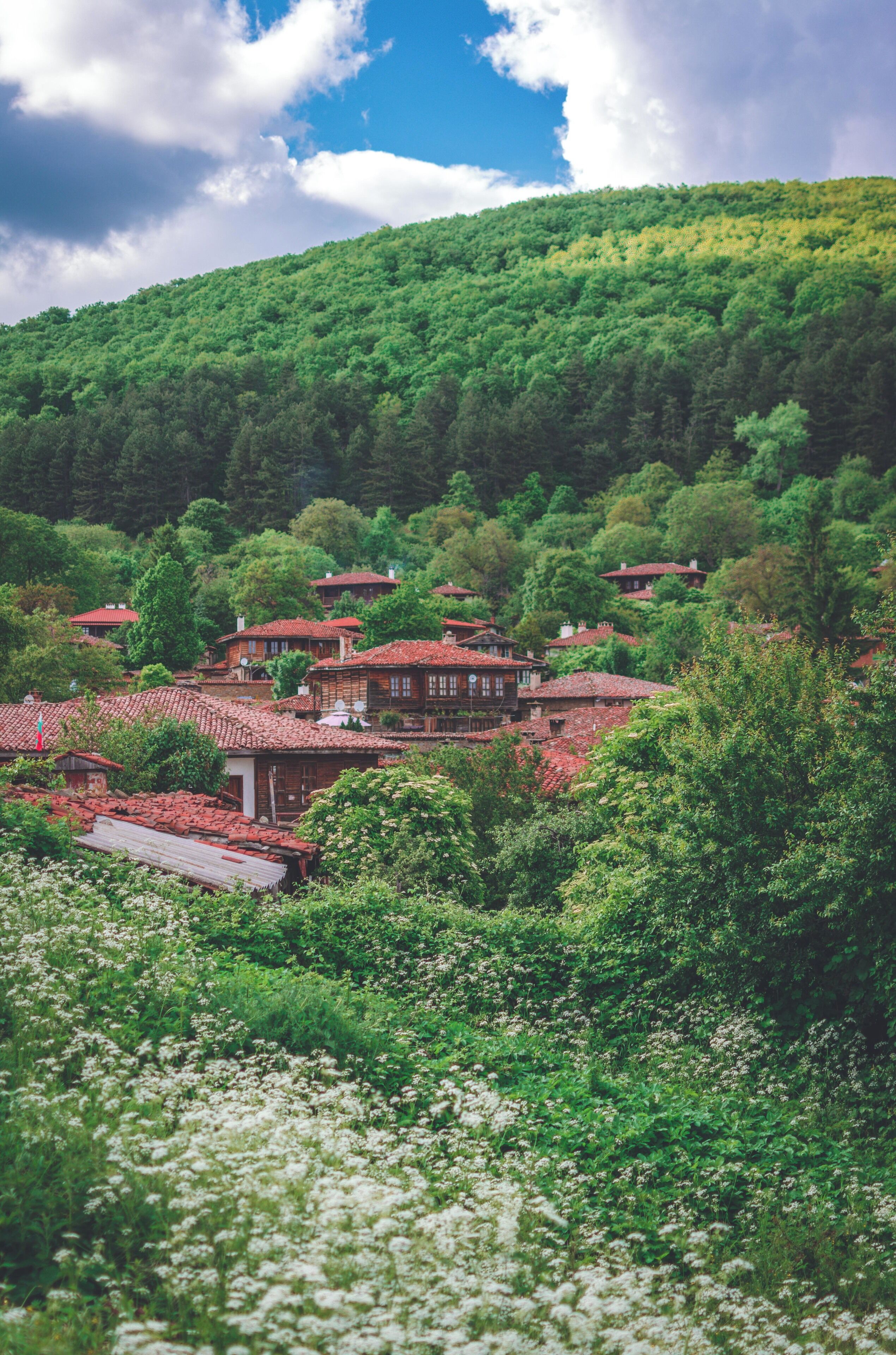 The small houses nestled in the mountains. 