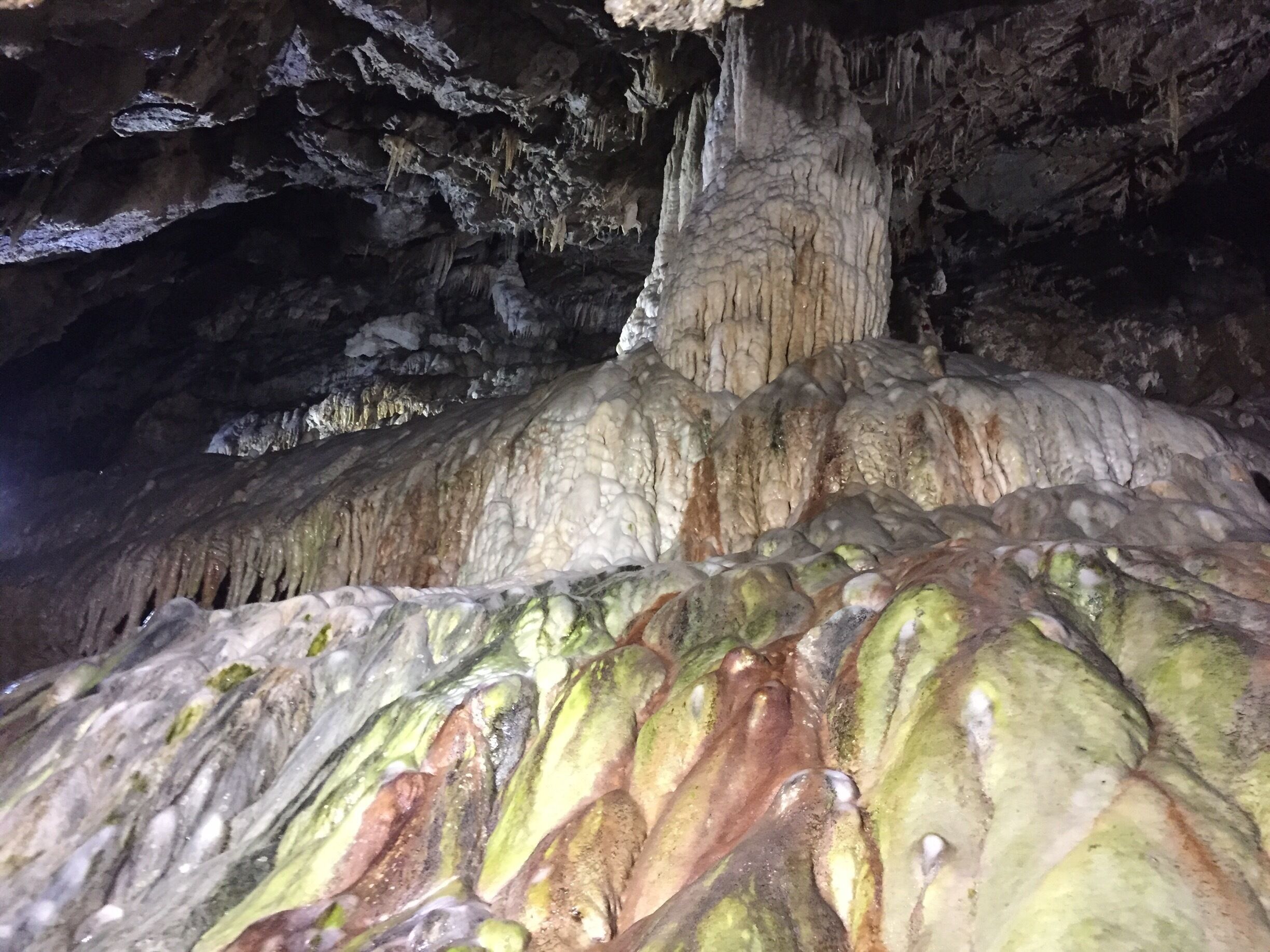 A cave with stalactites and stalagmites.