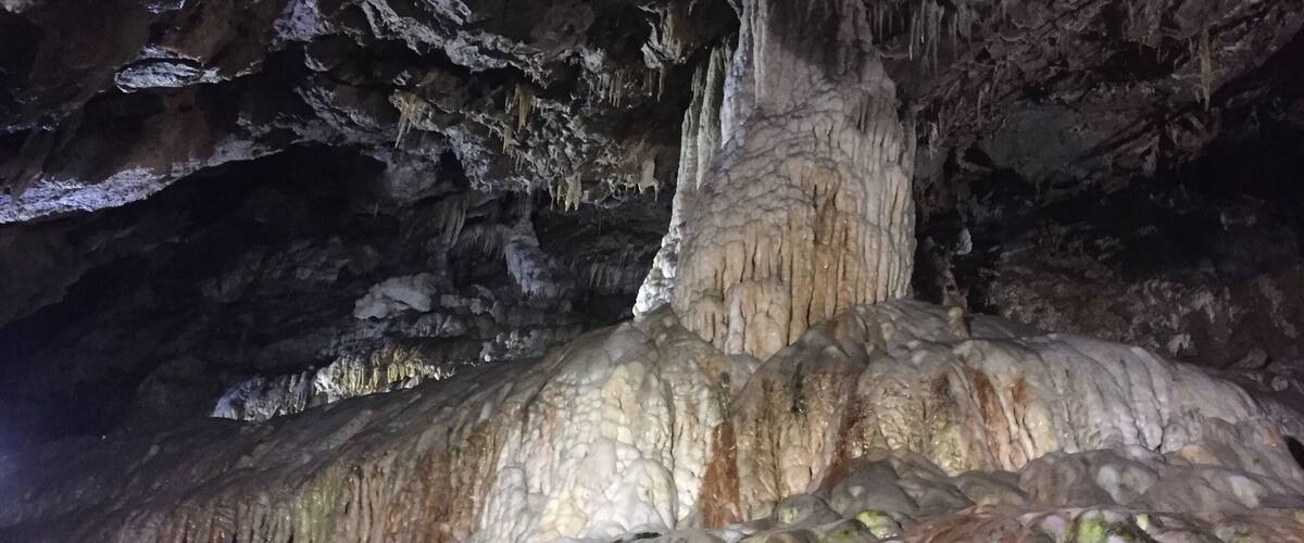 A cave with stalactites and stalagmites.