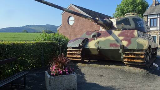 A tank for a bottle of cognac?
This German “Königstiger II” was abandoned in the Belgian Ardennes during the Battle of the Bulge (that started 75 years ago, in December 1944). Normally he would have been taken to be scrapped shortly after the war, but a woman from the village La Gleize (Jenny Geenen-Dewez, wife of a local inn-keeper) proposed the Americans who transported the Königstiger, to exchange the tank for a bottle of (French) cognac and ... they agreed! Believe it or not, this is a true story!
In 2015 the tank was repainted in its original colours. He is one of the 5 surviving tanks of this type in Europe.
http://www.december44.com/en/history_battle_of_the_bulgela_gleize.htm
#LocalSecrets #History
The Königstiger II had 185 mm armour on the front of the cupola and was equipped with the famous 88 mm cannon. This cannon was one of the strongest cannons from WW II and could pierce the front armour of most Allied tanks (such as the T-34 and the M4 Sherman) up to a distance of 1500 metres. The range of the cannon was 10 kilometres.