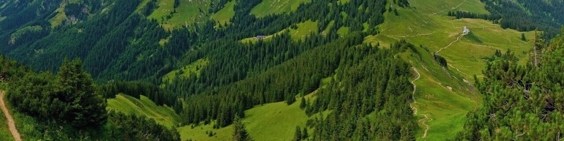 July 2015
Tannheimer Berge, Austria
The highest part of Tannheimer Berge mountains with summits Gimpel (2.173 m), Koellenspitze (2.238 m), Schneid (2.009 m) and Gehrenspitze (2.163 m). Tannheimer Berge belong to Allgaeuer Alps and Northern Limestone Alps and are very popular for sports climbing. The plateau below is the Schneetalalm and Schneetalalpe is suitable for easy hiking eg. from Hahnenkamm.
