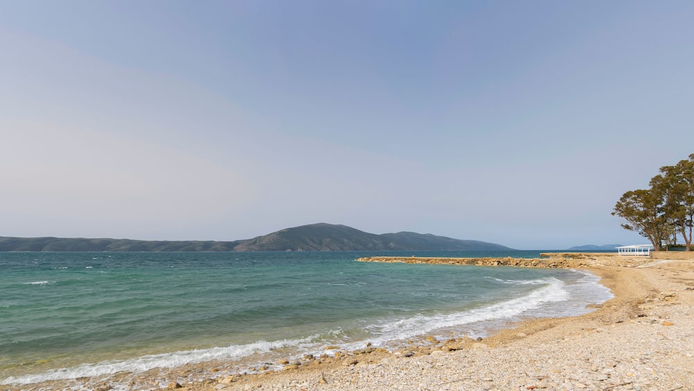 Albania, Radhime Vlore beach, emerald color clear sea water
