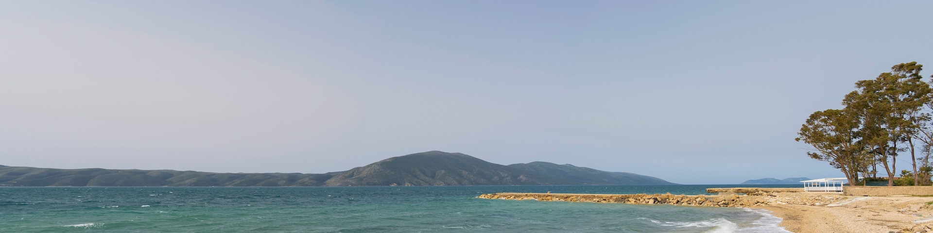 Albania, Radhime Vlore beach, emerald color clear sea water