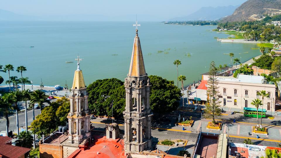 Chapala church towers overlooking the lake and boardwalk in Jalisco, Mexico