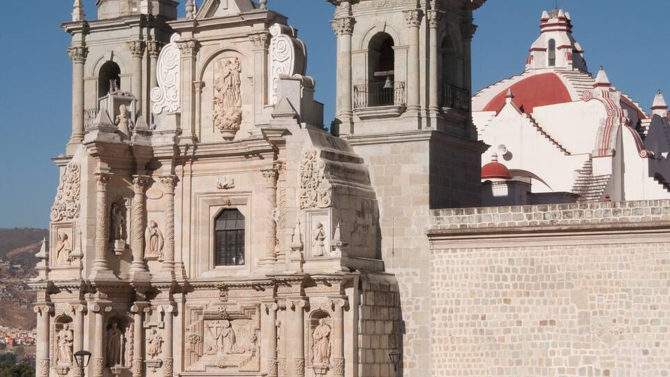 A historic church with ornate architecture and two bell towers.