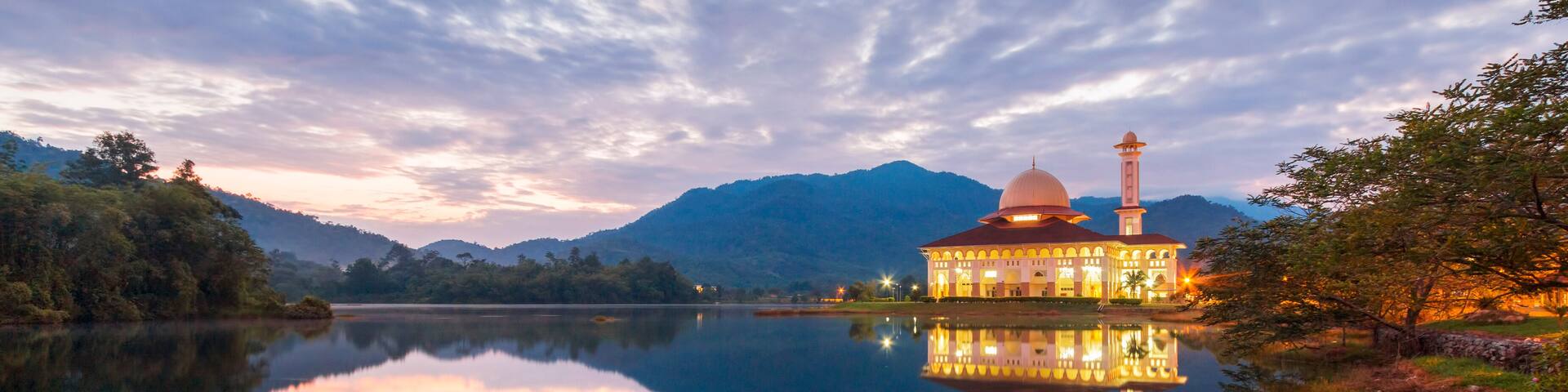 Beautiful view of Darul Quran mosque with reflections during sunset at Kuala Kubu, Selangor, Malaysia.