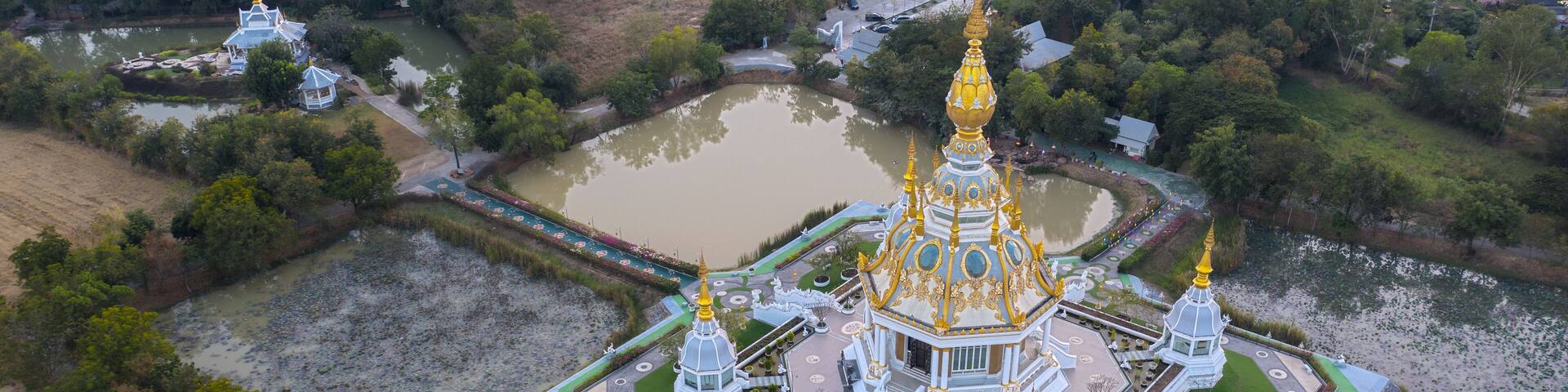 Aerial view shot of eastern Khon Kaen with Wat Thung Setthi temple at sunset in Thailand.