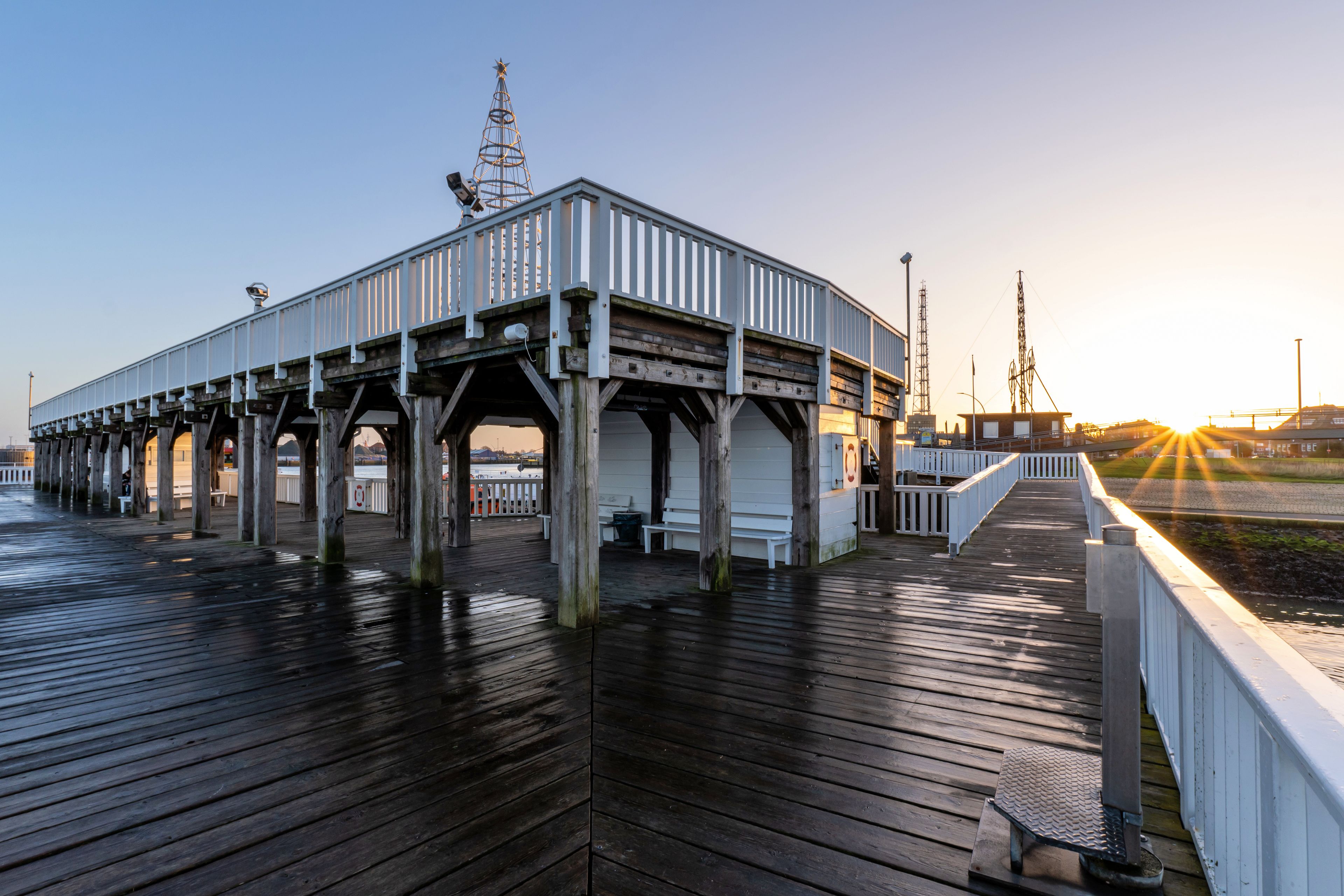 ‘Alte Liebe’ (‘Old Love’), famous observation deck in Cuxhaven, Germany at the river Elbe at sunset