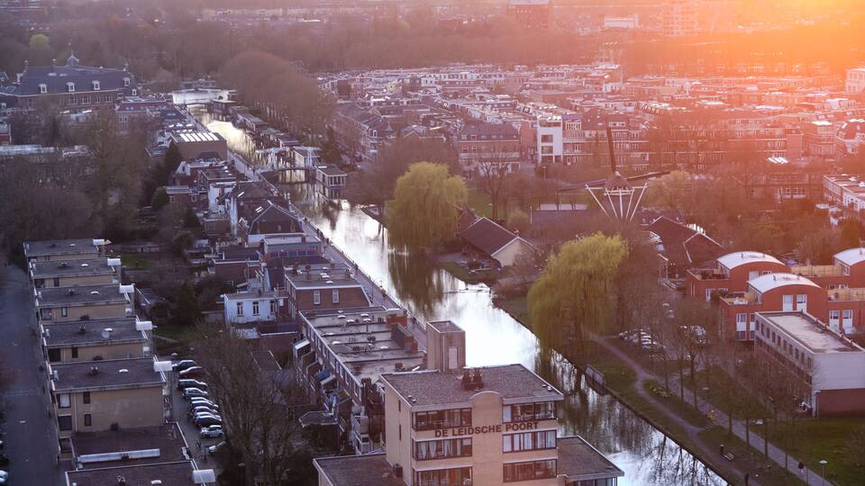 Aerial view of the Leidse Rijn canal and the streets of Lombok neighbourhood in the province of Utrecht, Netherlands.
