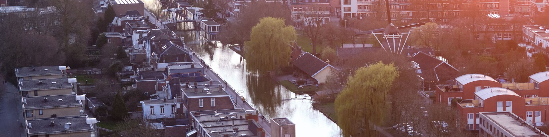 Aerial view of the Leidse Rijn canal and the streets of Lombok neighbourhood in the province of Utrecht, Netherlands.