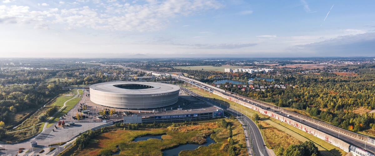 Aerial wide panoramic autumn view over Fabryczna district and city stadium in Wroclaw, Poland.