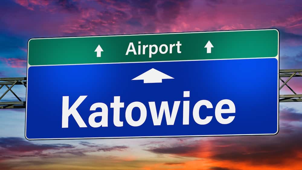 Road sign indicating direction to the city of Katowice, Poland