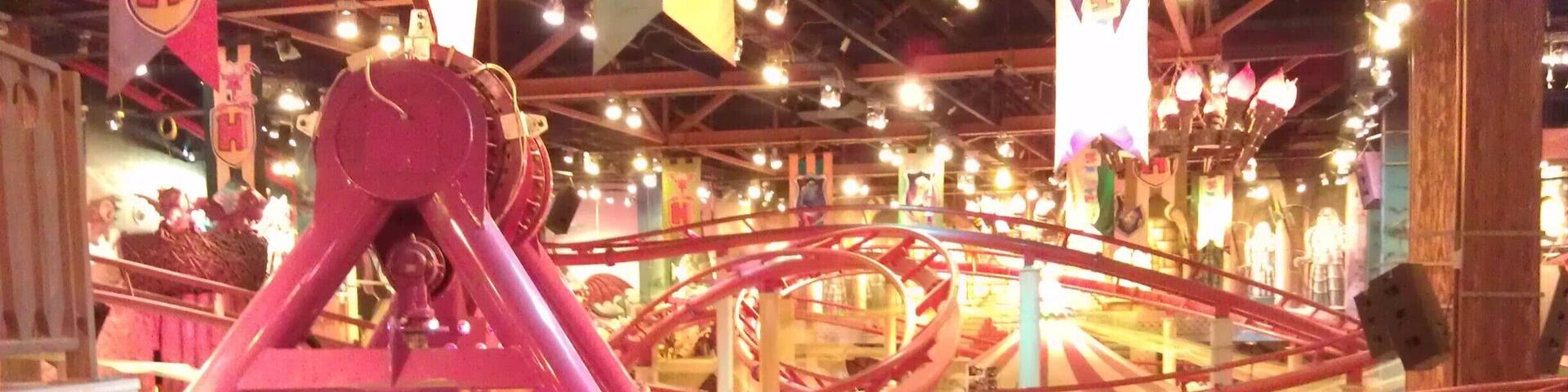 Amusement park inside a shopping centre in Moscow. Contains a collection of children's rides and small thrill rides including the family roller coaster Babylon.