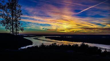 Colorful Sunset over the Tennessee River looking down from the mountain in Section.