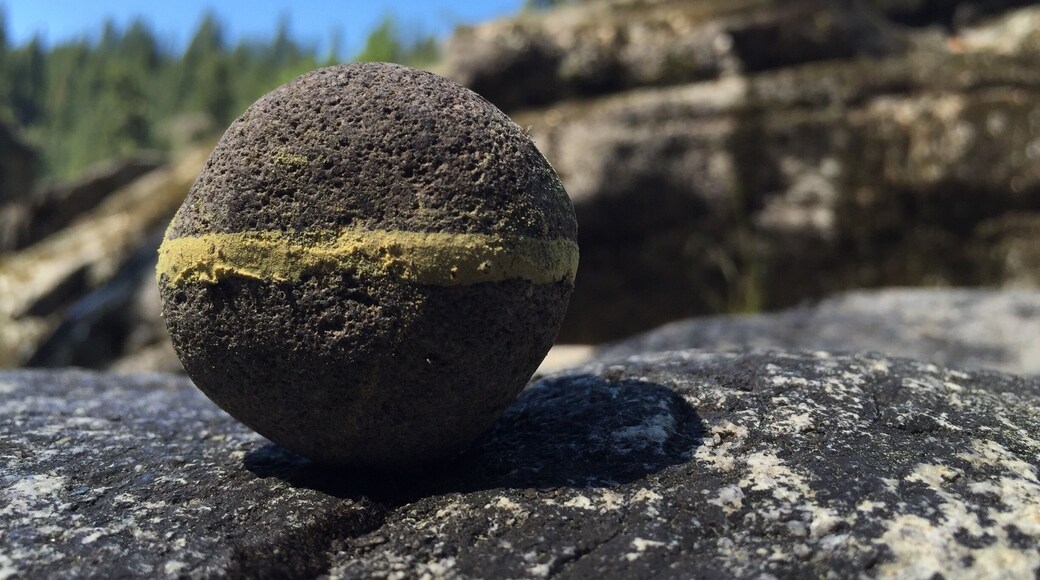 The first rock is about 2 inches in diameter, the one one the right is about 20 feet tall.