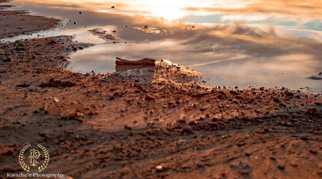 2020 of Jan 25th After the rain, look like a real lake, but not. :) Perfect sunset with left water.