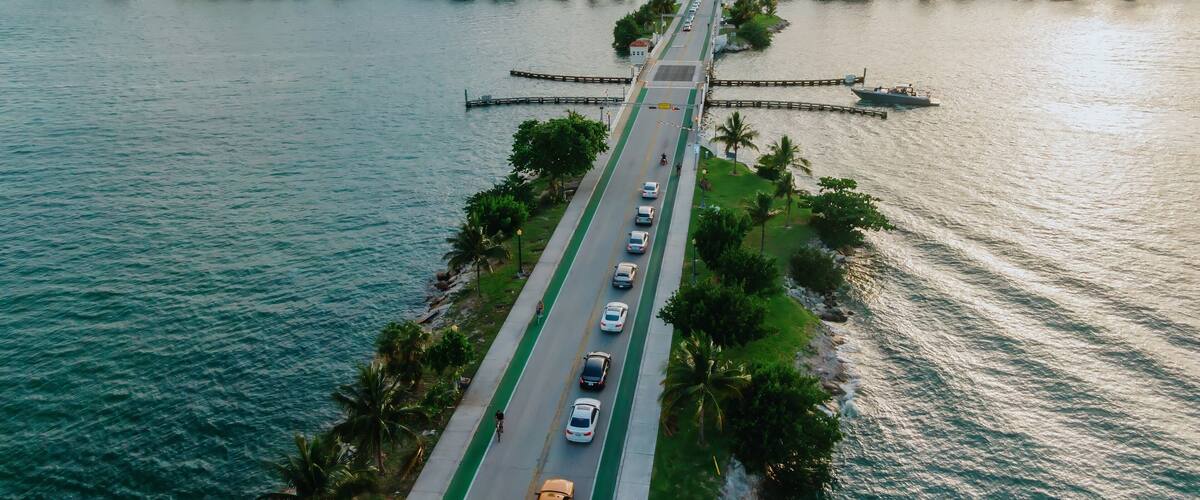 Cars waiting in line to cross the causeway bridge on the Venetian Islands, Miami, Florida, United States.