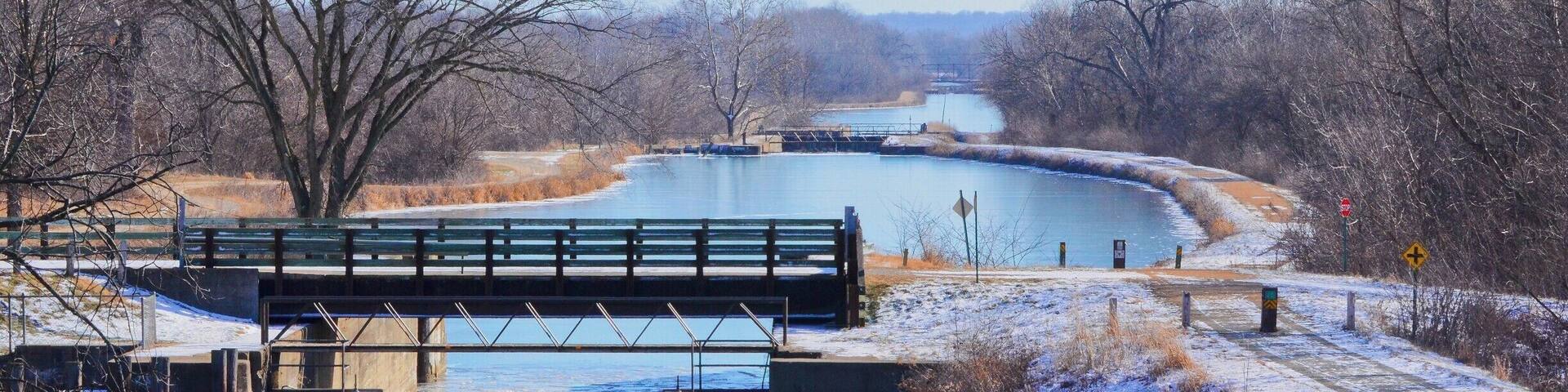 This is a photo from the top of a bridge showing the tiered lock system flowing west to east on the Hennepin Canal. From the feeder canal in Sheffield, Il, the water flows east to west AND west to east from the center of the pool. Difficult to explain:)