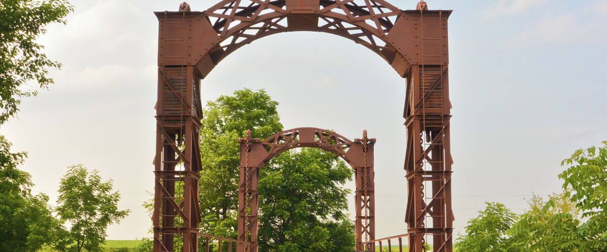 An original (non-working) drawbridge constructed in 1904 by the Pittsburg Steel Construction company. This bridge is in excellent shape and it still used by vehicles going through the area.