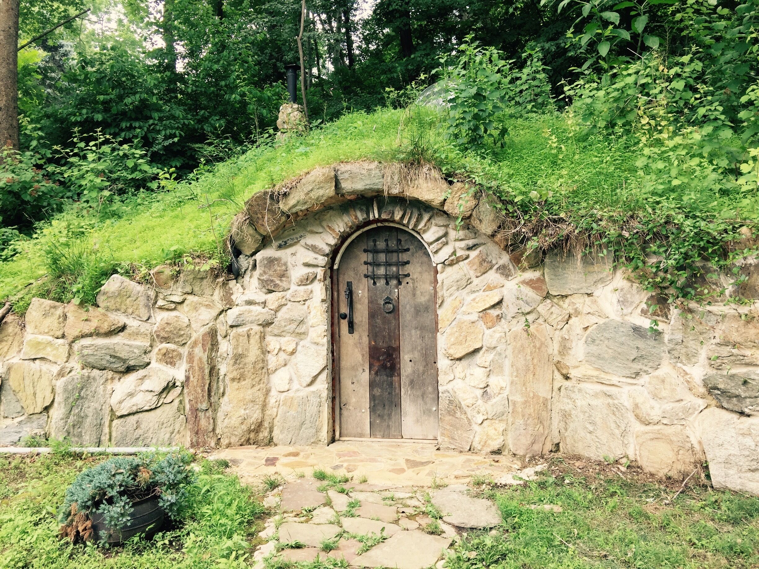 An authentic Hobbit House built right into the hill.