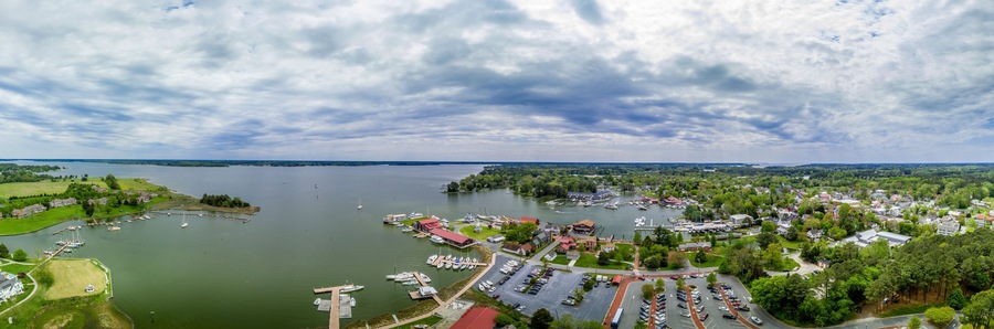 Aerial panorama of shipyard and lighthouse in St. Michaels harbor in Maryland in the Chesapeake Bay