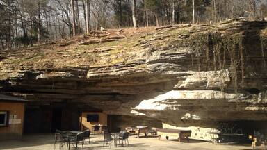 The Cave Bar and Grill in Lanagan Missouri. Dine inside in an actual cave or on the patio. They have great food and cold beer