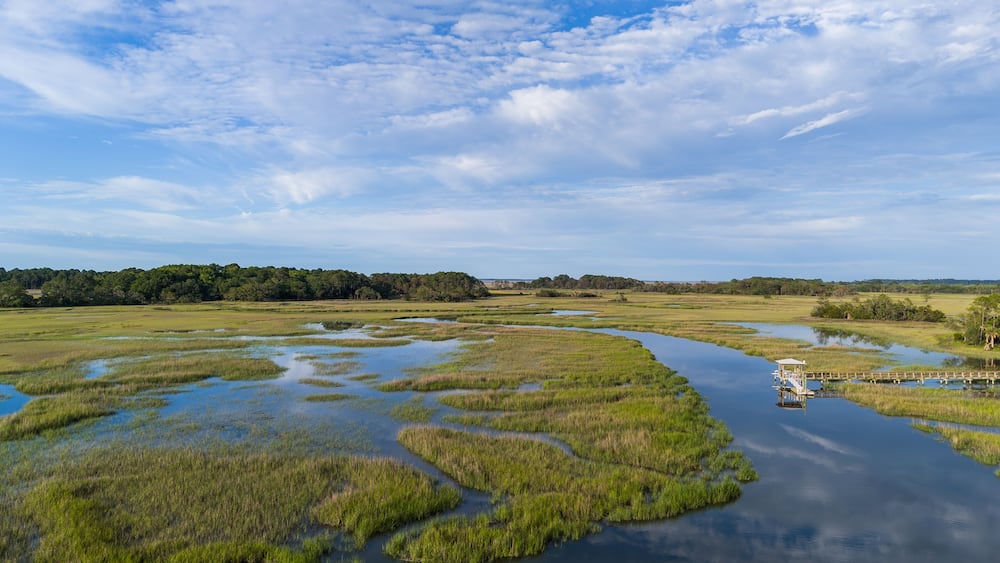 Low county marsh views from drone