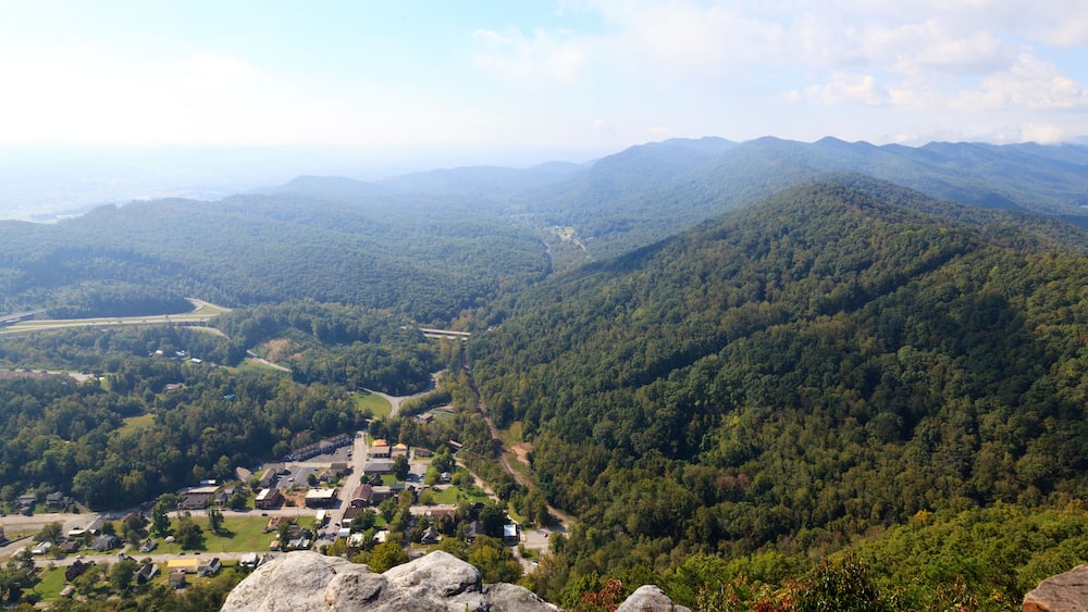 A mountainous landscape with a town nestled in the valley.