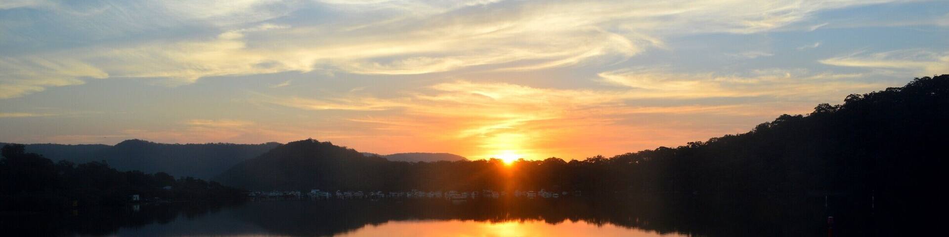 A view from the window in the train as you pass through the Hawkesbury heading north to the Central Coast and beyond. Sun setting but the water reflects the sky leavining it looking like a staircase into the clouds.
#Blue