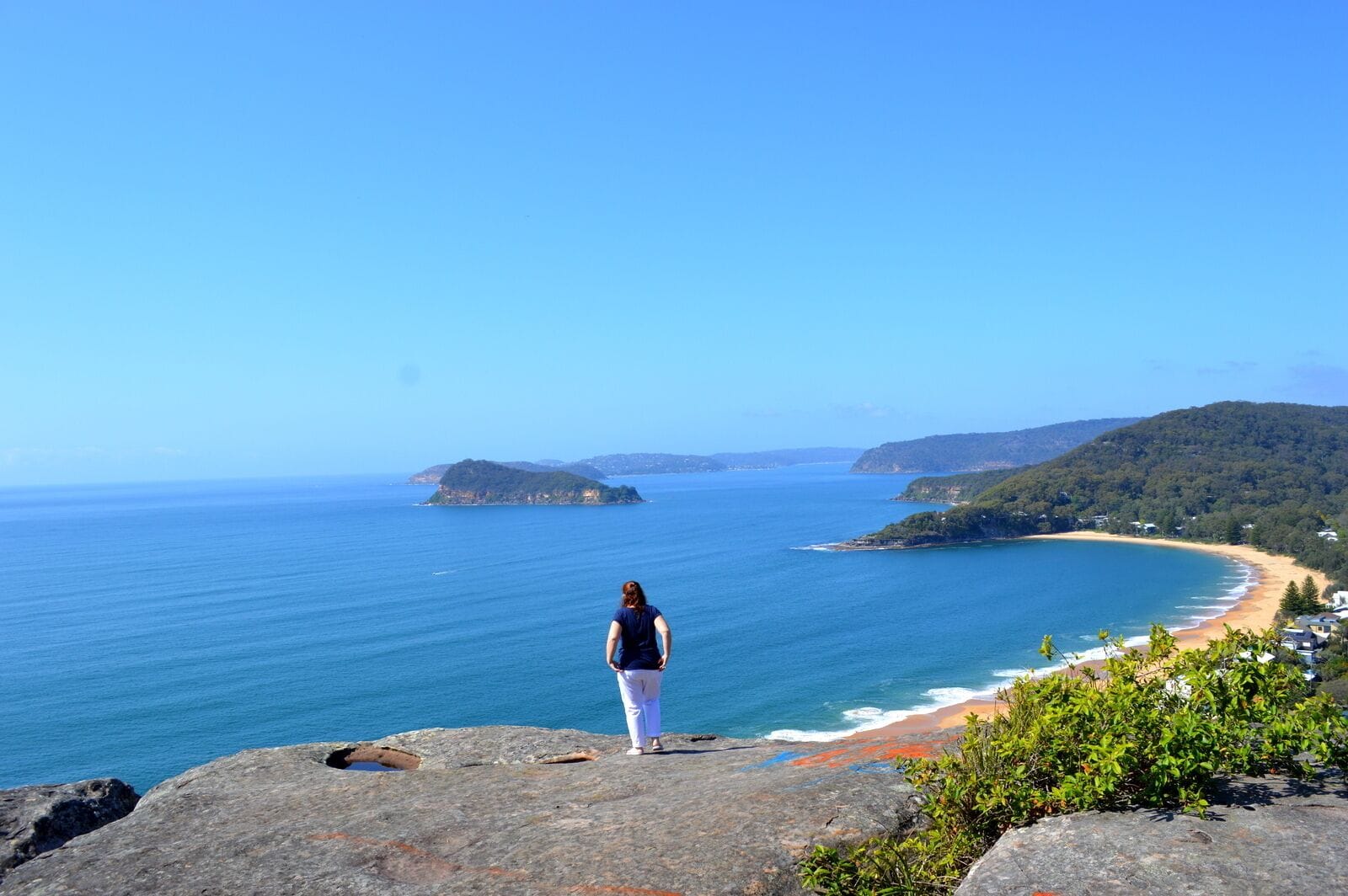 If you are after some amazing views across to Lion Island and down along Pearl Beach and the coastline - check out this spot.  
Park in the Reserve where there is a water tower and walk through the gates up the fire trail.  Each side of the road is covered in bushland.  All of a sudden there is a clearing and a large rock ledge.  
You feel on top of the world when here. 