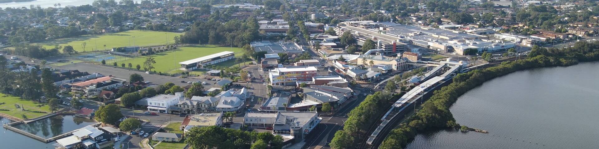 Aerial drone reverse rotating view of Woy Woy on the Central Coast of New South Wales, Australia
